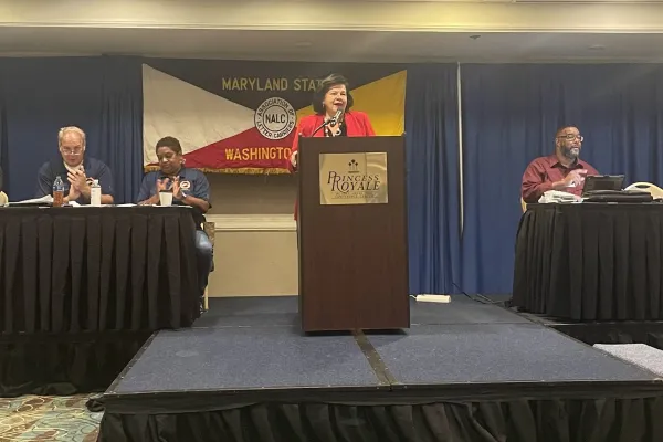 President Edwards speaks with union workers at the MD & DC Council of the National Association of Letter Carriers.