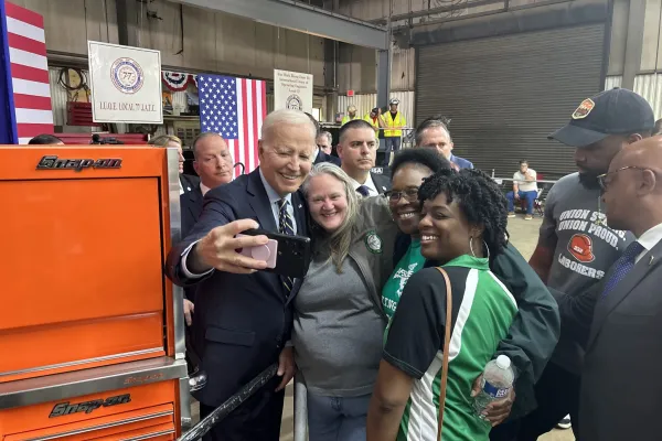 President Biden takes photo with union members in Maryland. 