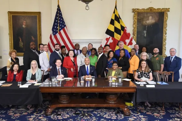 Bill signing photo of HB 2. 