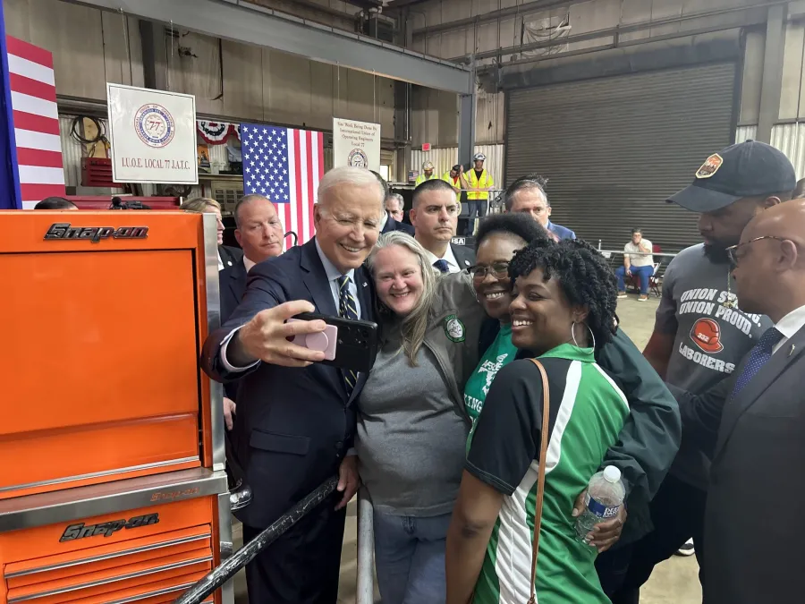 President Biden takes photo with union members in Maryland. 